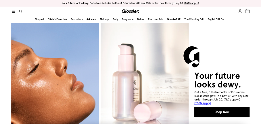 Glossier's website uses an above the fold promotional bar