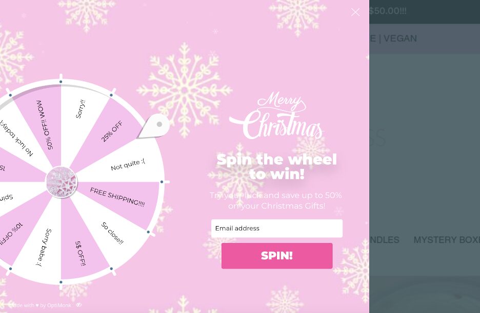 Holiday-themed spin-the-wheel popup by Holy Class Cosmetics with vibrant colors and sleek design.